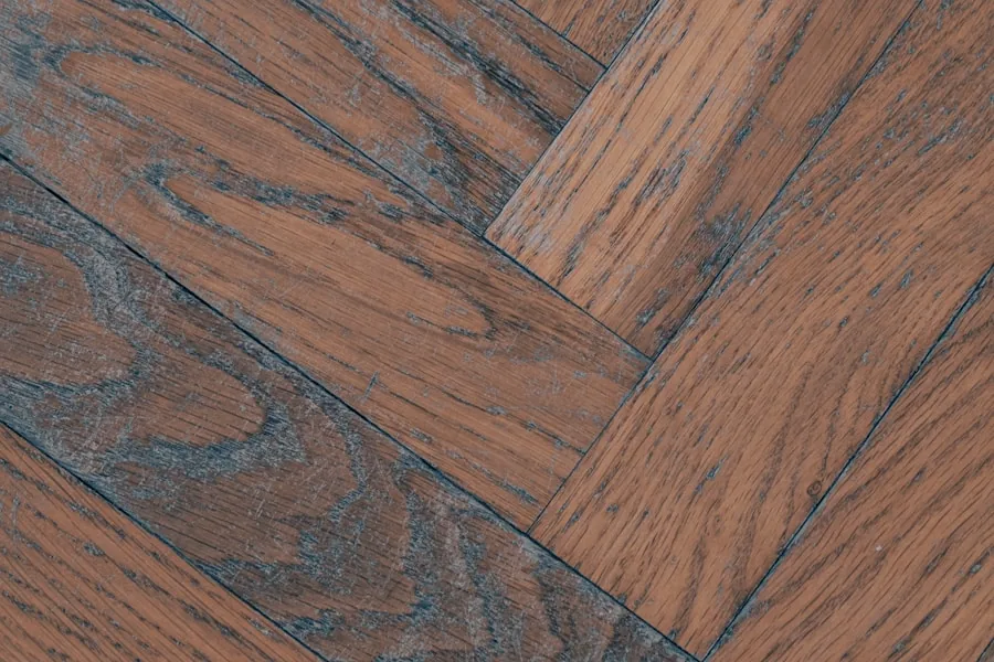 Reddish oak laid in a herringbone pattern