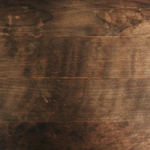 Dark walnut surface with visible open grain